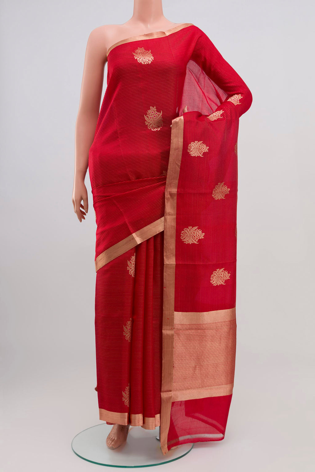 Red Banarasi Katan Silk Saree with Zari Butta on the body and Thin Zari Line.  displayed on a mannequin