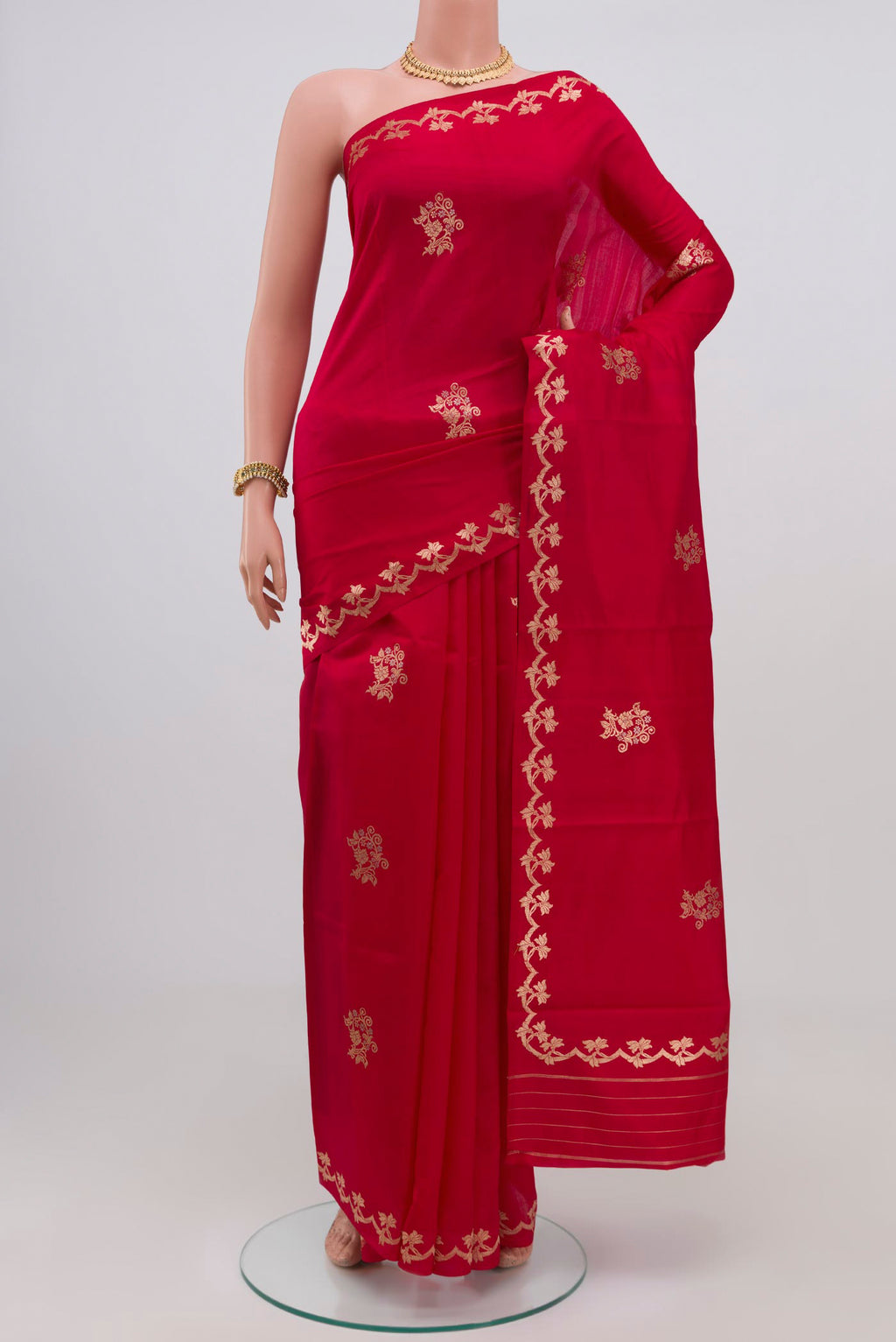 Red Banarasi Katan Silk Saree with Zari Butta on the body and Zari Border.  displayed on a mannequin