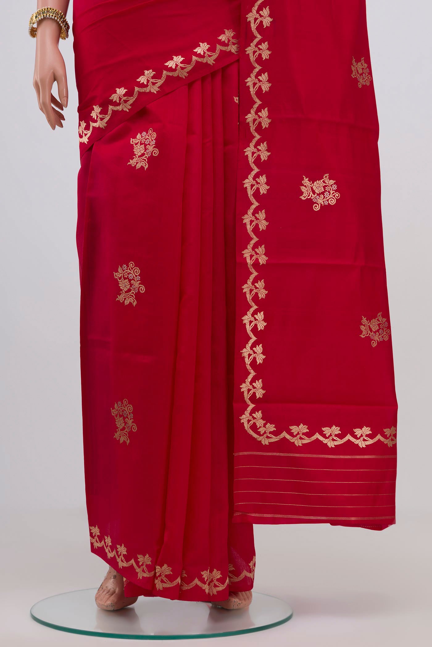 Pleats and pallu of Red Banarasi Katan Silk Saree with Zari Butta on the body and Zari Border. 