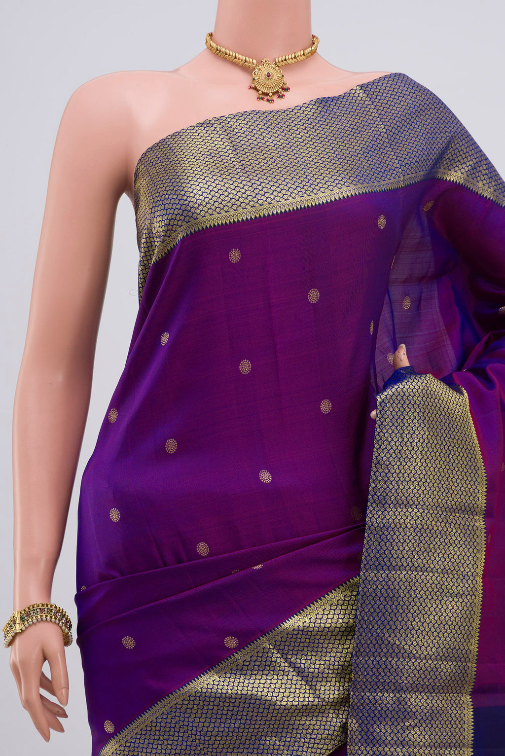 Border image of Purple Kanchipuram Silk Saree with Zari Butta on the body and Zari Border. 