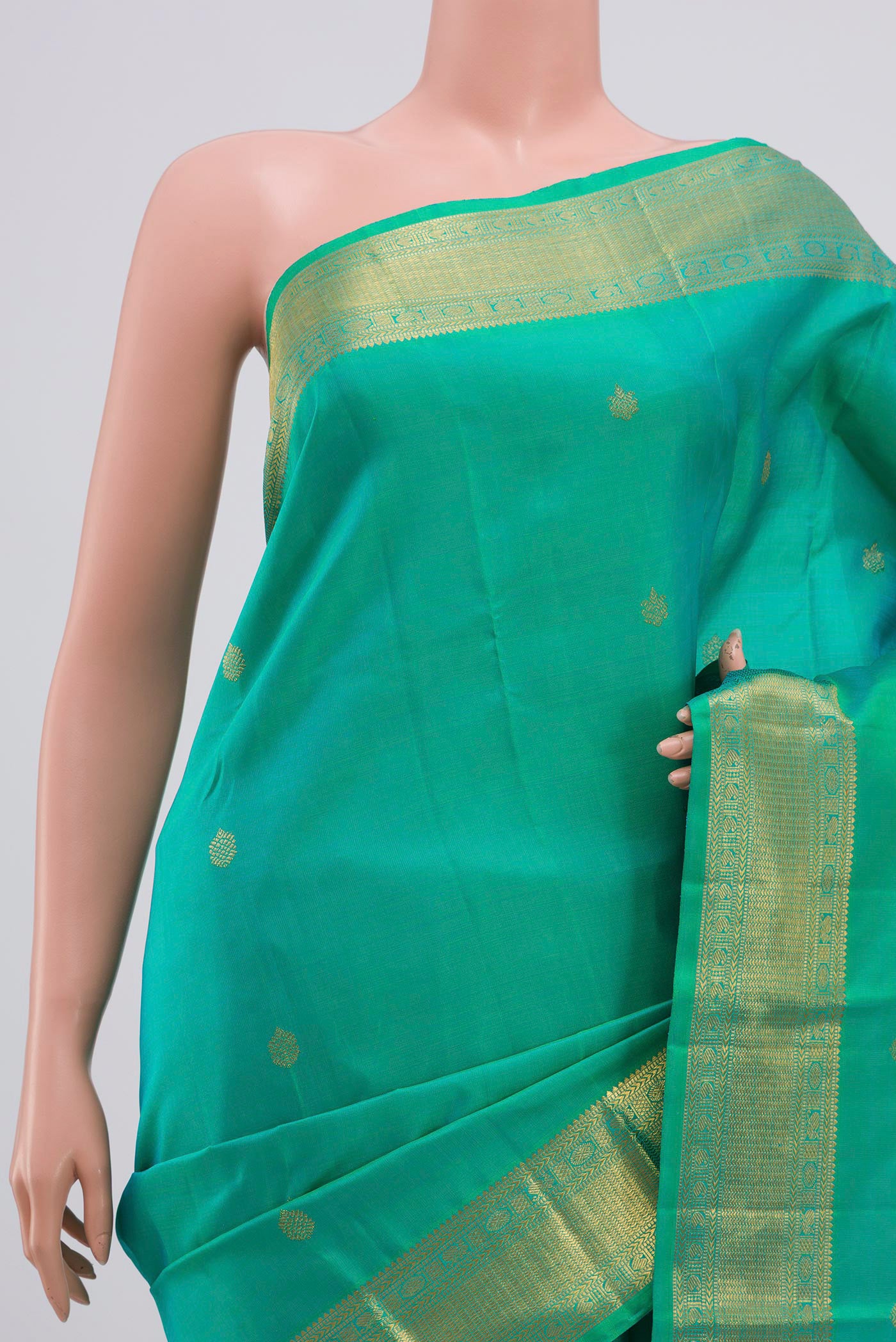 Border image of Pure Silk Pure Zari Green Kanjivaram Saree with Zari Butta on the body and Zari Border. 