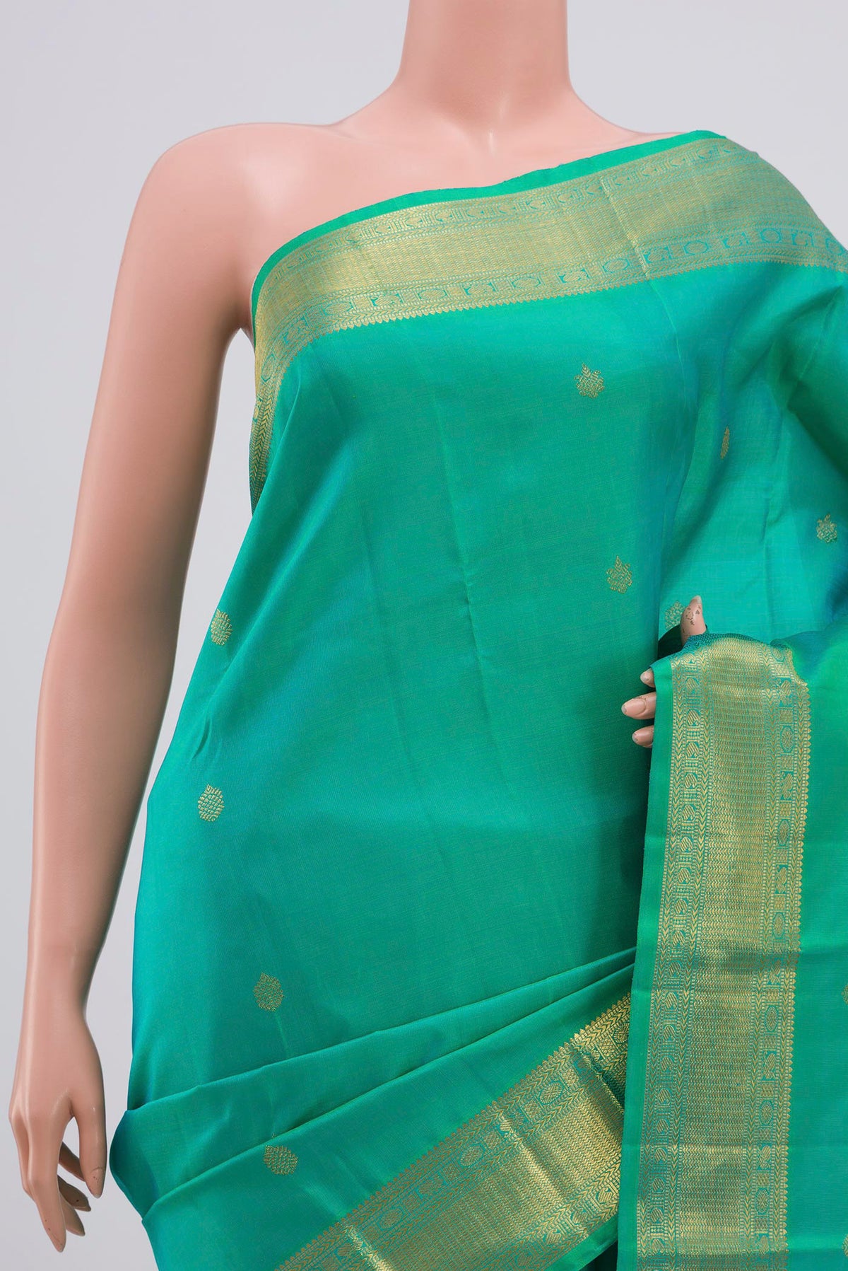 Border image of Pure Silk Pure Zari Green Kanjivaram Saree with Zari Butta on the body and Zari Border. 