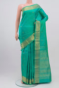 Pure Silk Pure Zari Green Kanjivaram Saree with Zari Butta on the body and Zari Border.  displayed on a mannequin