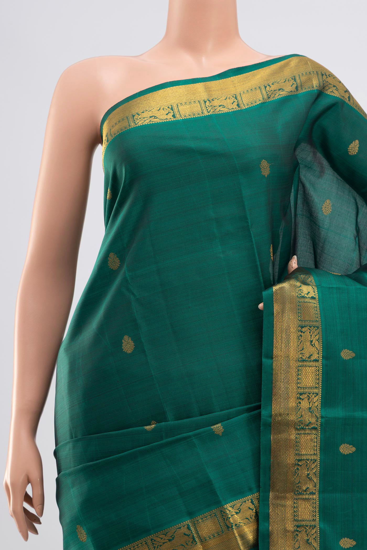 Border image of Pure Silk Pure Zari Green Kanchipuram Saree with Zari Butta on the body and Zari Border. 