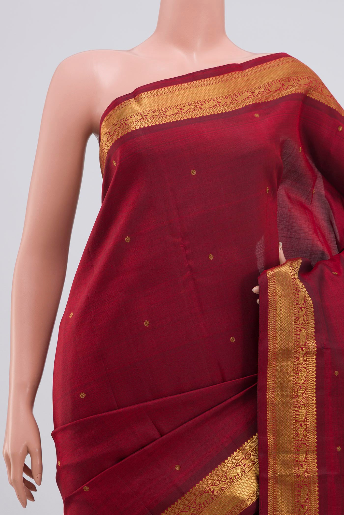 Border image of Pure Silk Pure Zari Maroon Kanchipuram Saree with Zari Butta on the body and Zari Border. 