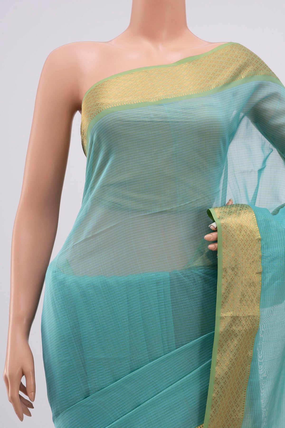 Border image of Sky Blue Maheshwari Silk Cotton Saree with Plain Body and Zari Border. 