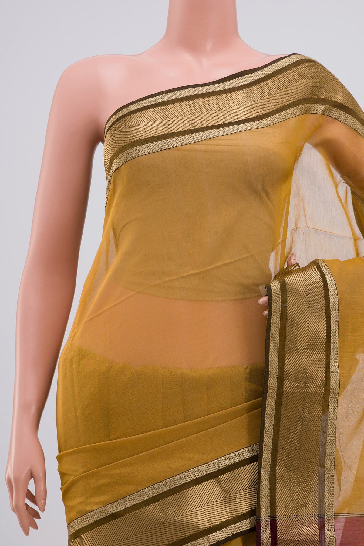 Border image of Beige Maheshwari Silk Cotton Saree with Plain Body and Zari Border. 