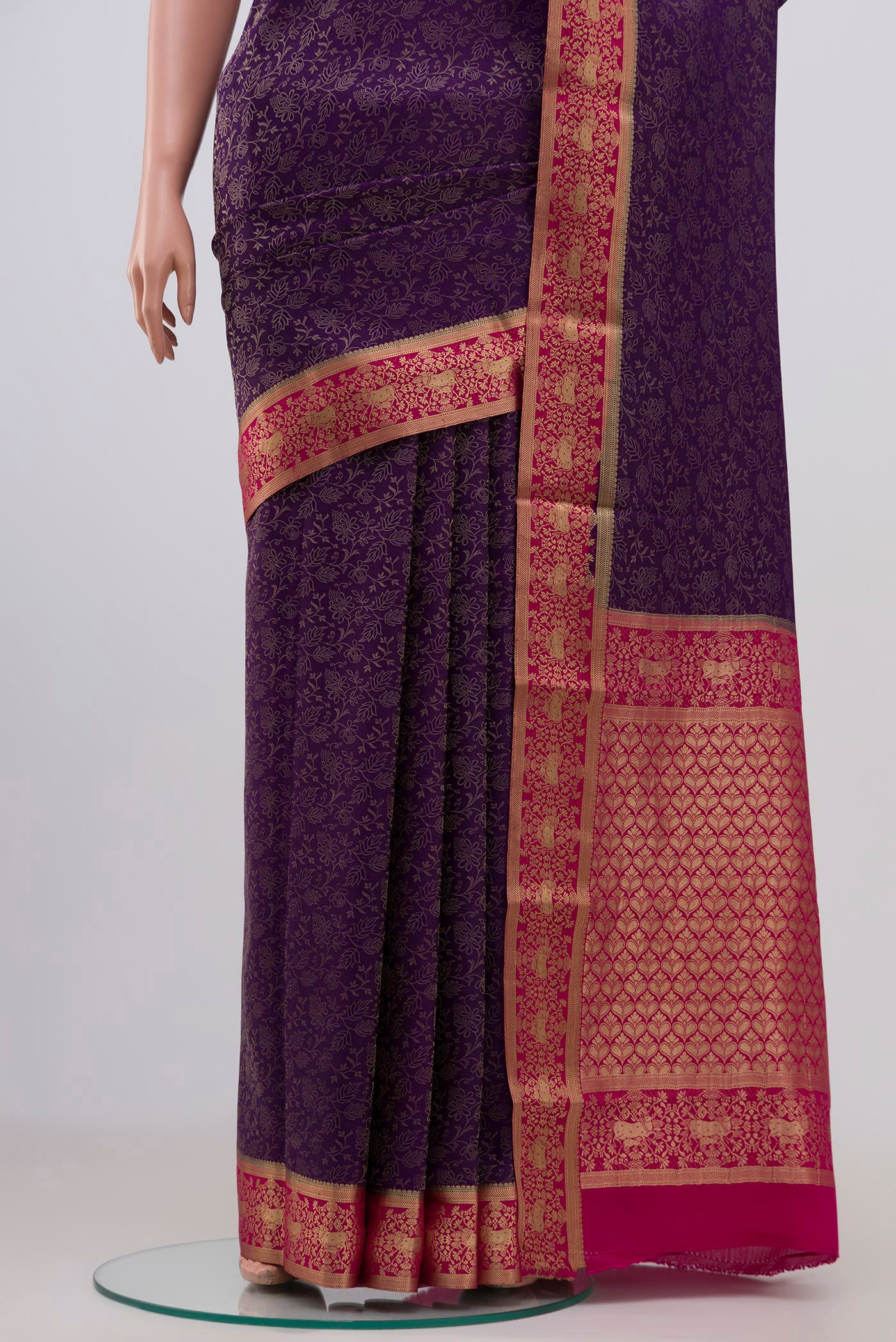 Pleats and pallu of Purple Mysore Crepe Saree with Zari Brocade on the body and Zari Border. 