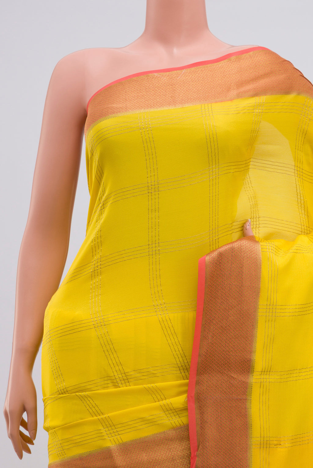 Border image of Yellow Crepe Saree with Checked design on the body and Zari Border. 