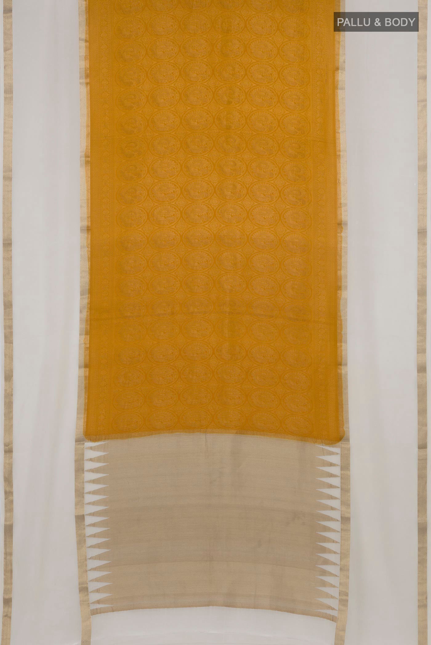 Flat view of Mustard Mysore Crepe Saree with Zari Brocade on the body and Zari Border. 