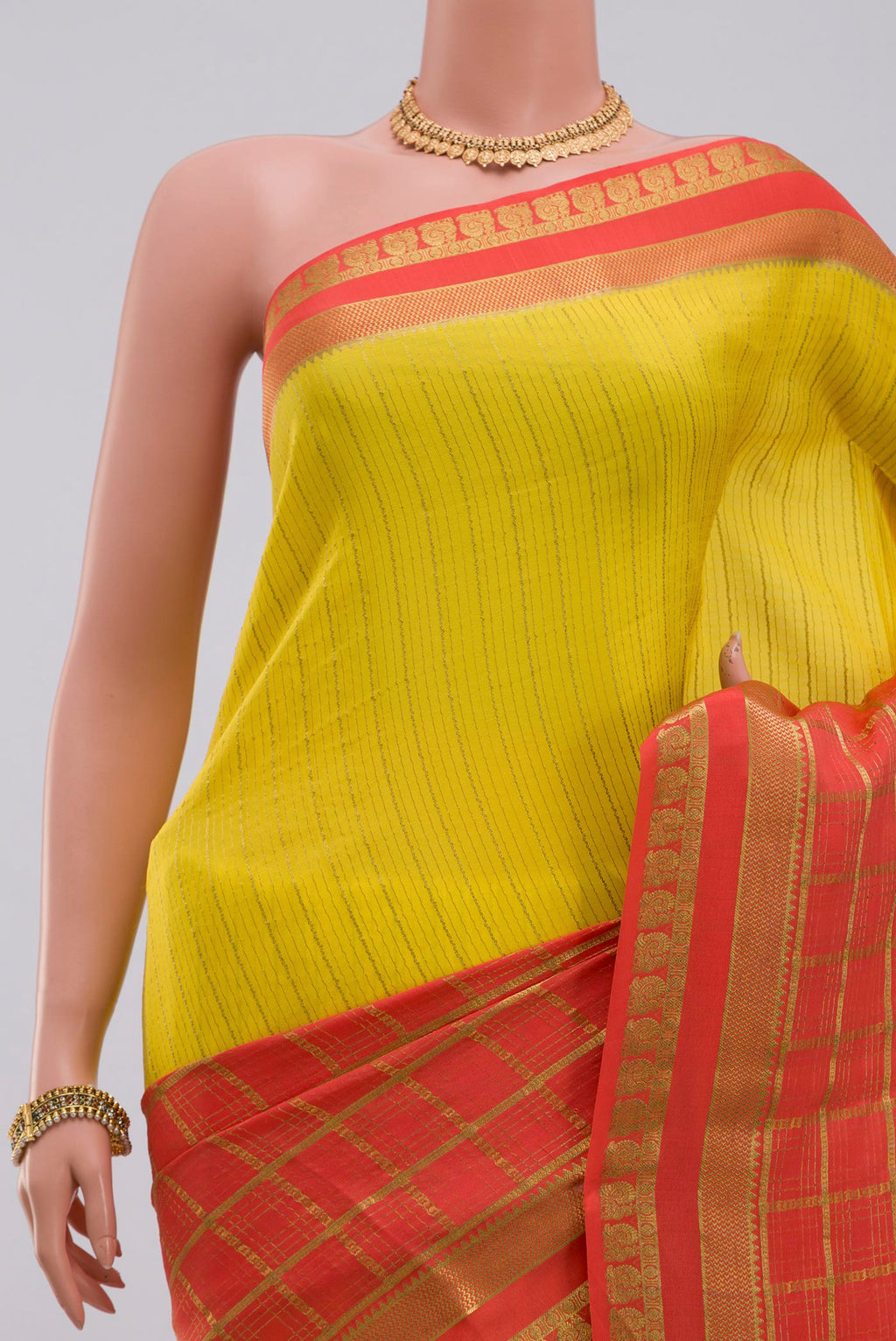 Border image of Yellow Crepe Saree with Fancy on the body and Zari Border. 