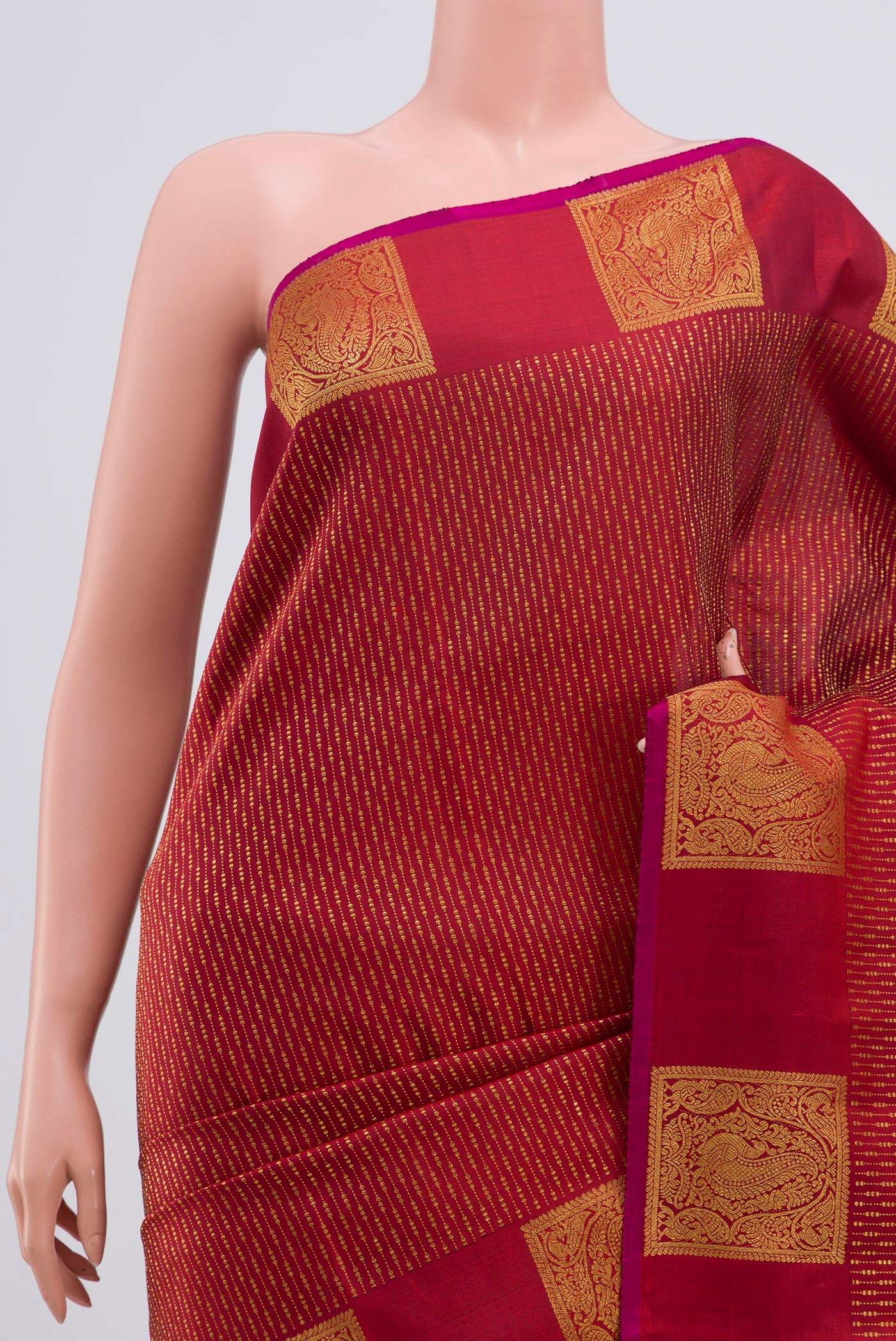 Border image of Maroon Kanjivaram Saree with Stripes on the body and Fancy Border. 