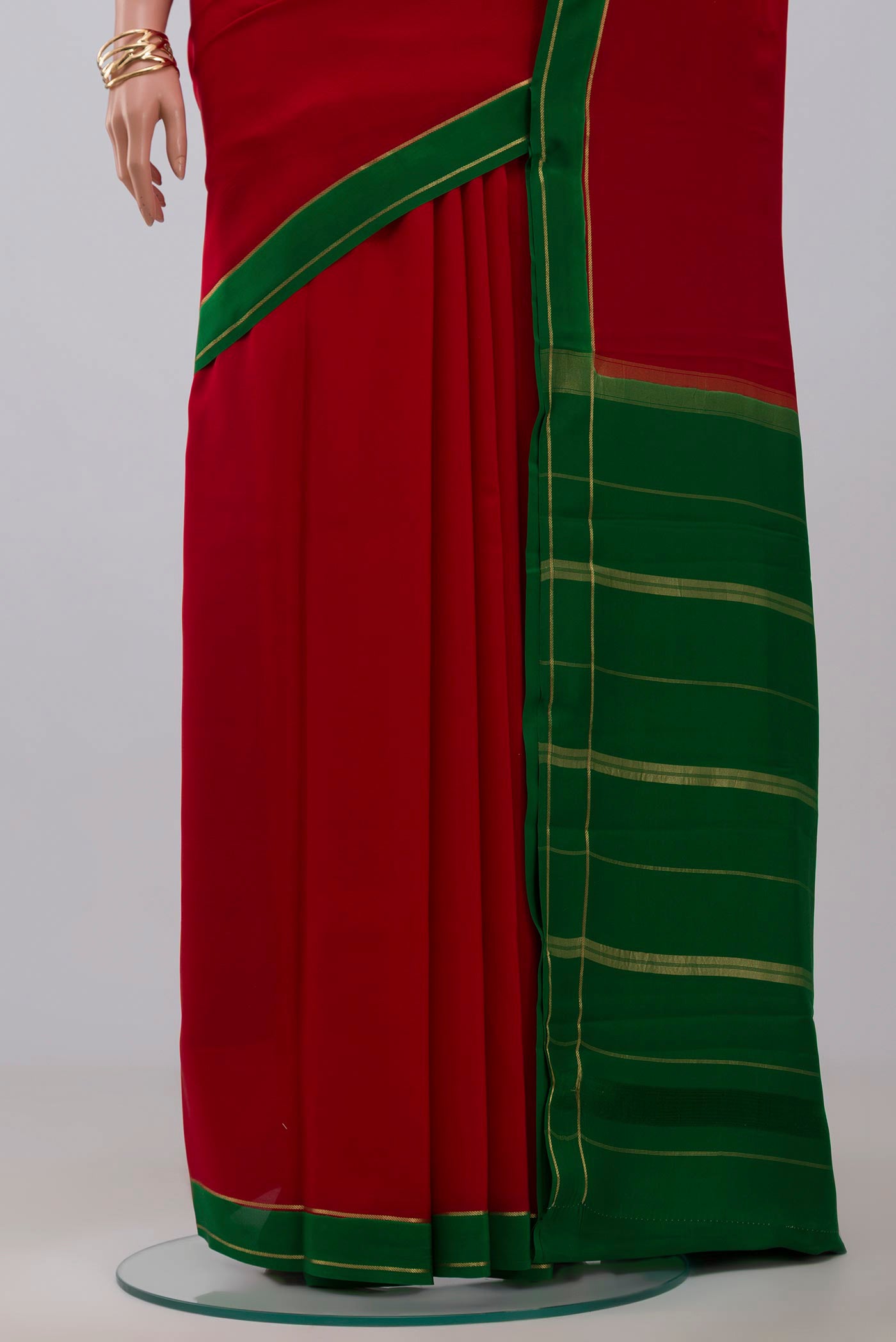 Pleats and pallu of Pure Silk Pure Zari Red Mysore Silk Saree with Plain Body and Thin Zari Line. 