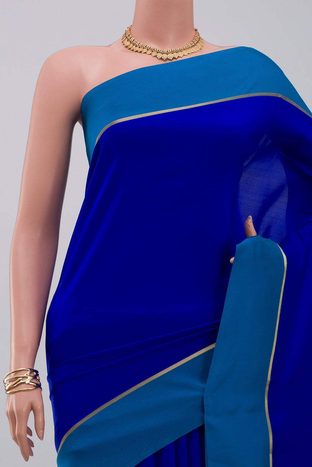 Border image of Pure Silk Pure Zari Dark Blue Mysore Silk Saree with Plain Body and Thin Zari Line. 