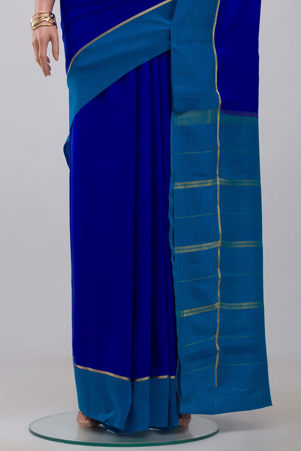 Pleats and pallu of Pure Silk Pure Zari Dark Blue Mysore Silk Saree with Plain Body and Thin Zari Line. 