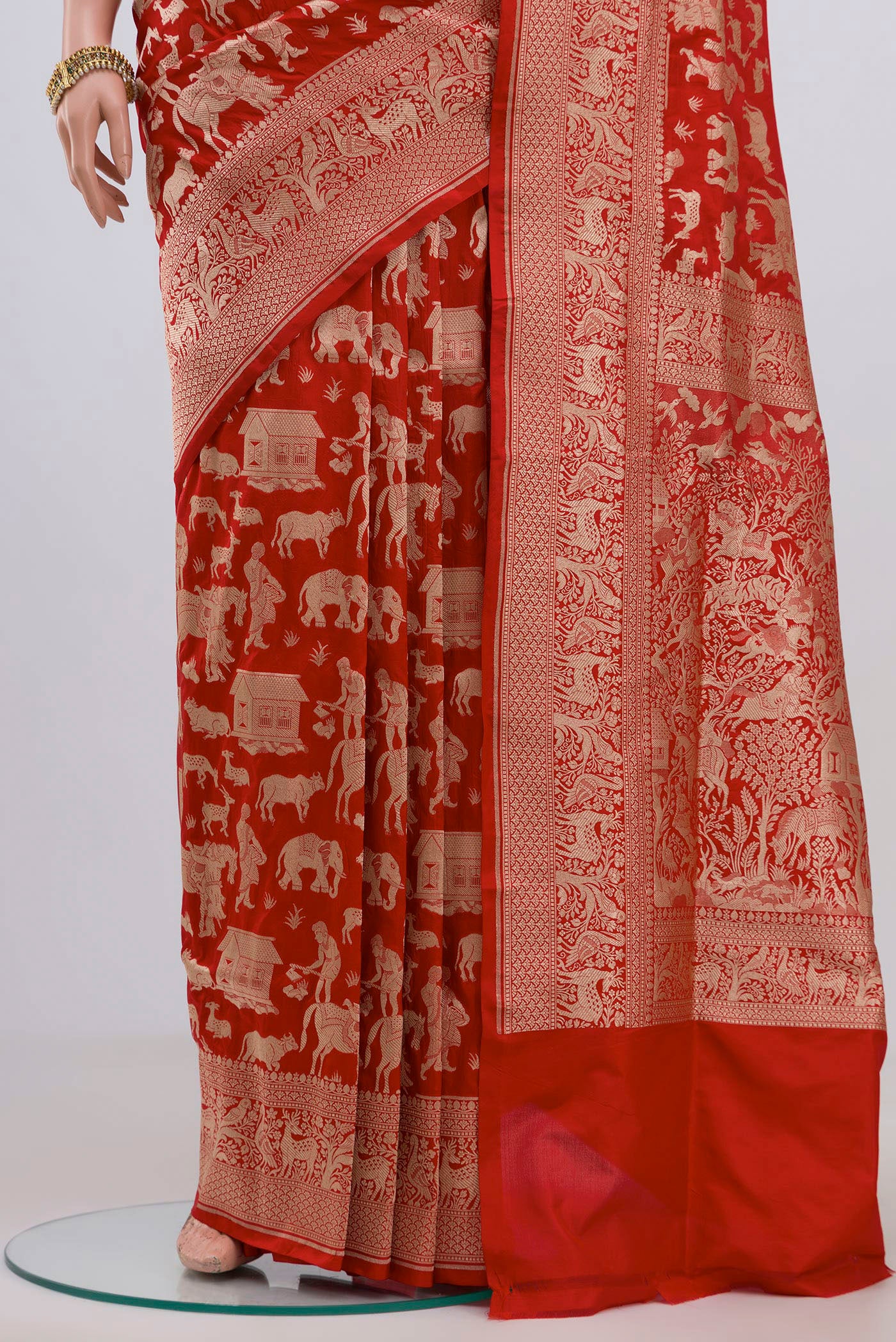 Pleats and pallu of Red Banarasi Saree with Zari Brocade on the body and Zari Border. 