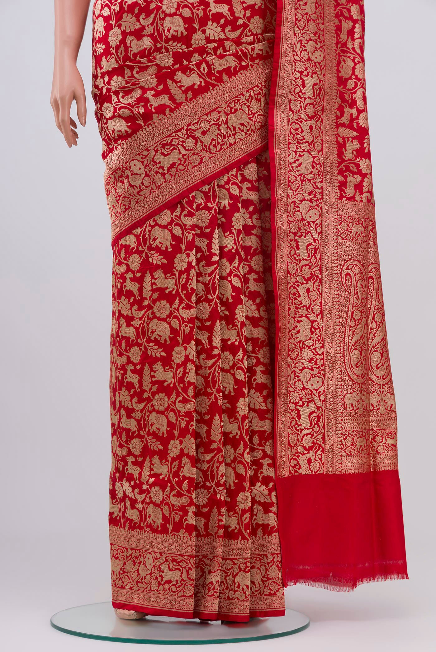 Pleats and pallu of Red Banarasi Silk Saree with Zari Brocade on the body and Zari Border. 