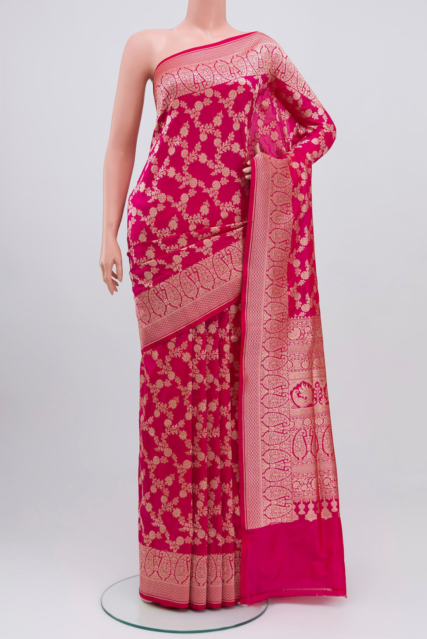 Pink Banarasi Silk Saree with Zari Brocade on the body and Zari Border.  displayed on a mannequin