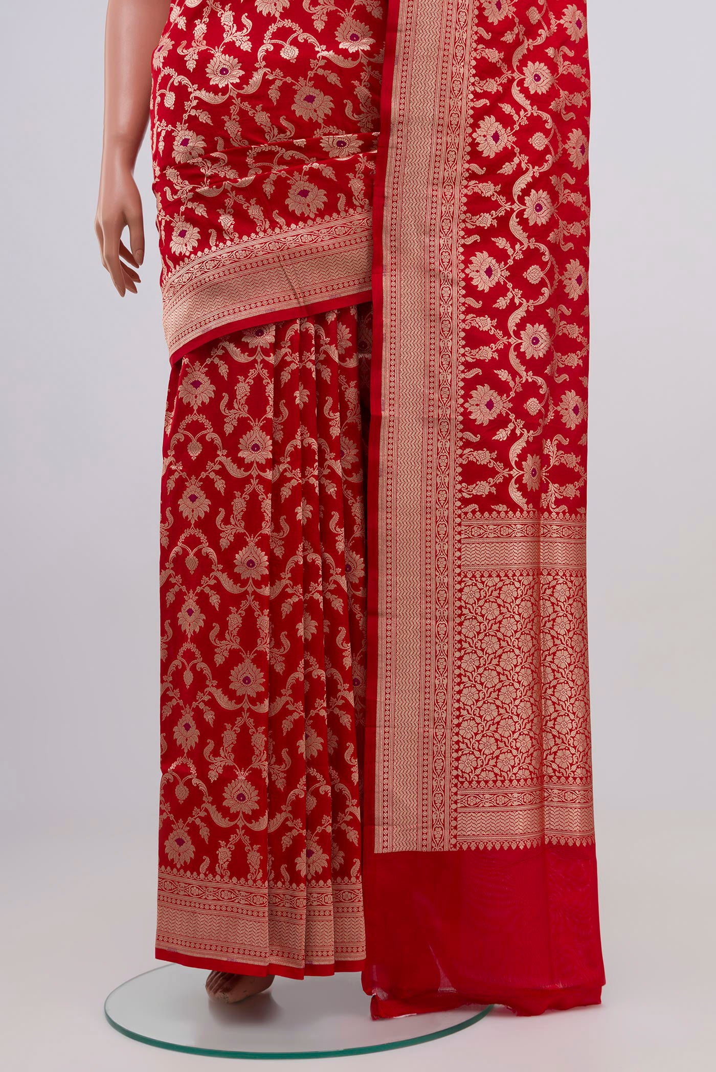 Pleats and pallu of Red Banarasi Silk Saree with Zari Brocade on the body and Zari Border. 