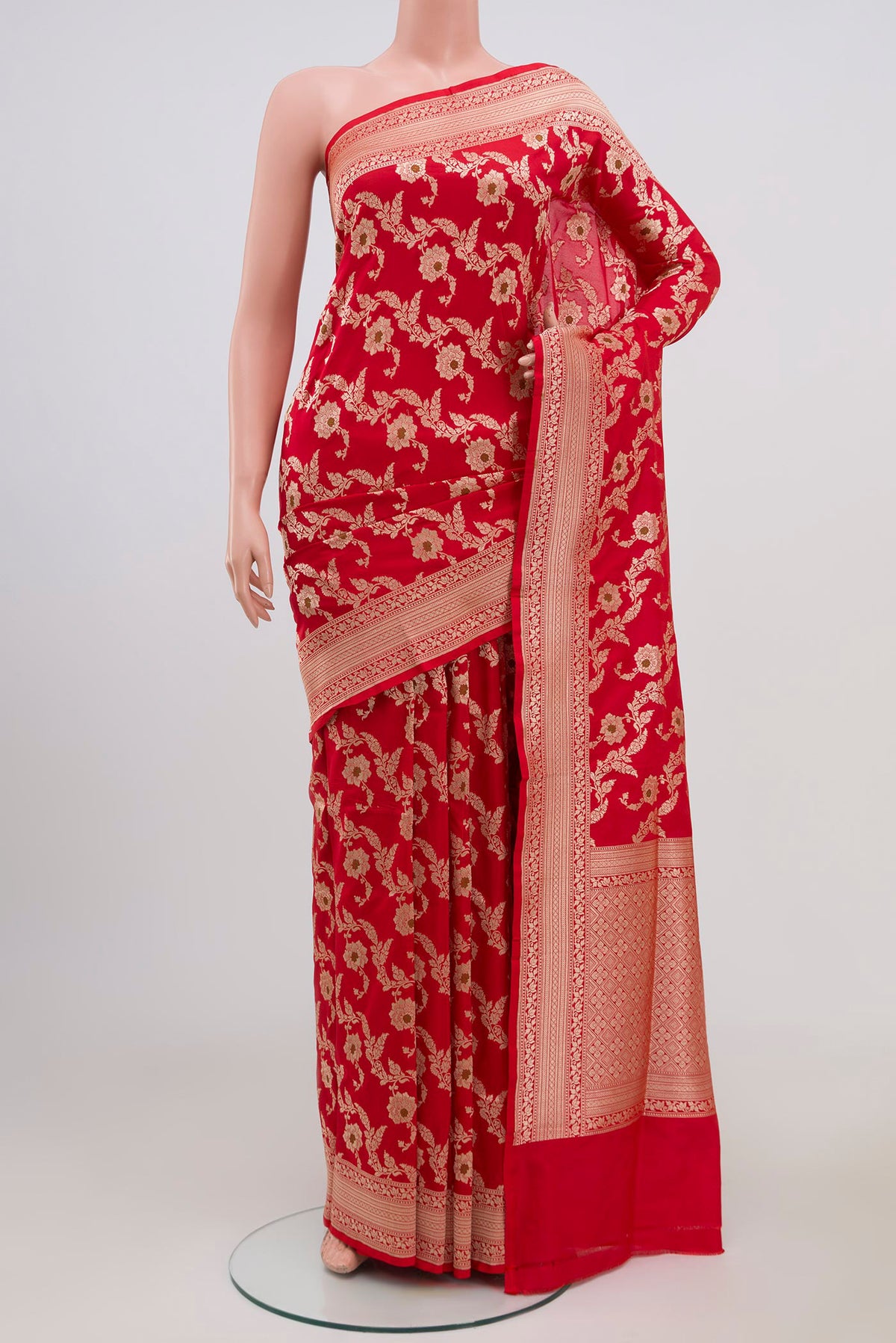 Red Banarasi Saree with Zari Brocade on the body and Zari Border.  displayed on a mannequin