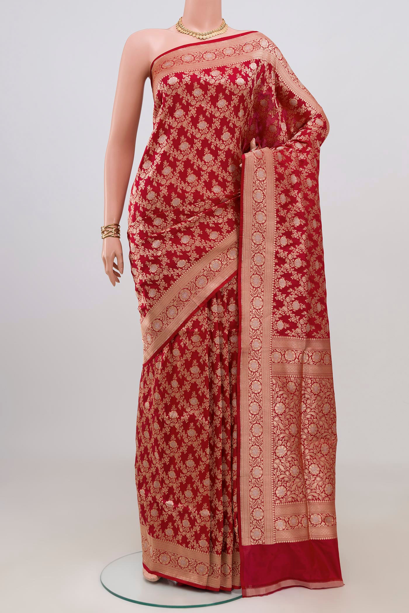 Red Banarasi Silk Saree with Zari Brocade on the body and Zari Border.  displayed on a mannequin