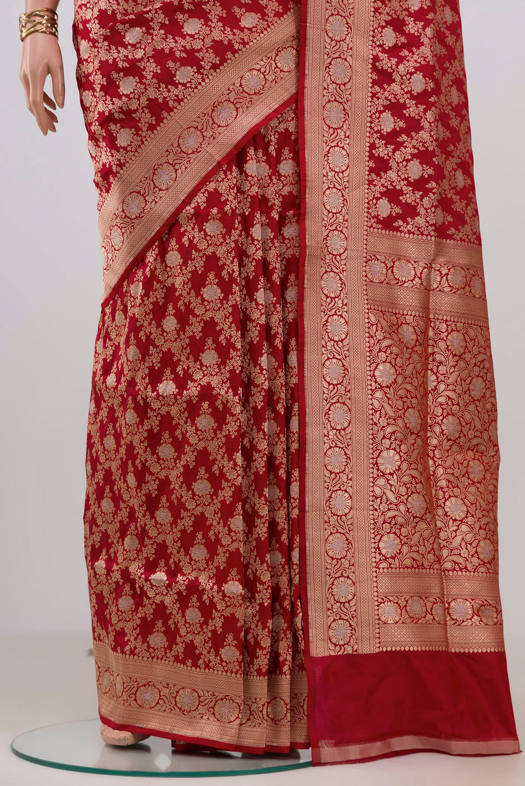 Pleats and pallu of Red Banarasi Silk Saree with Zari Brocade on the body and Zari Border. 