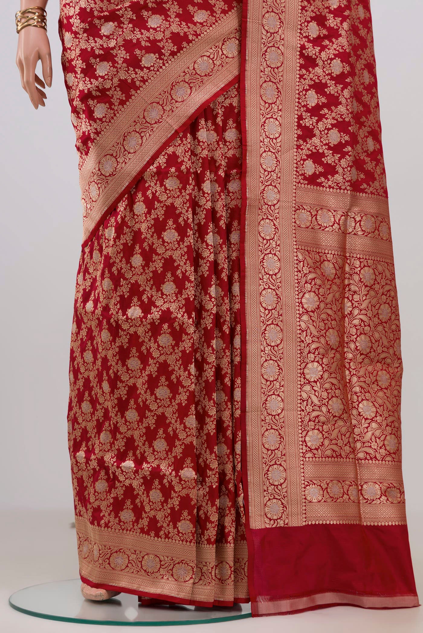 Pleats and pallu of Red Banarasi Silk Saree with Zari Brocade on the body and Zari Border. 