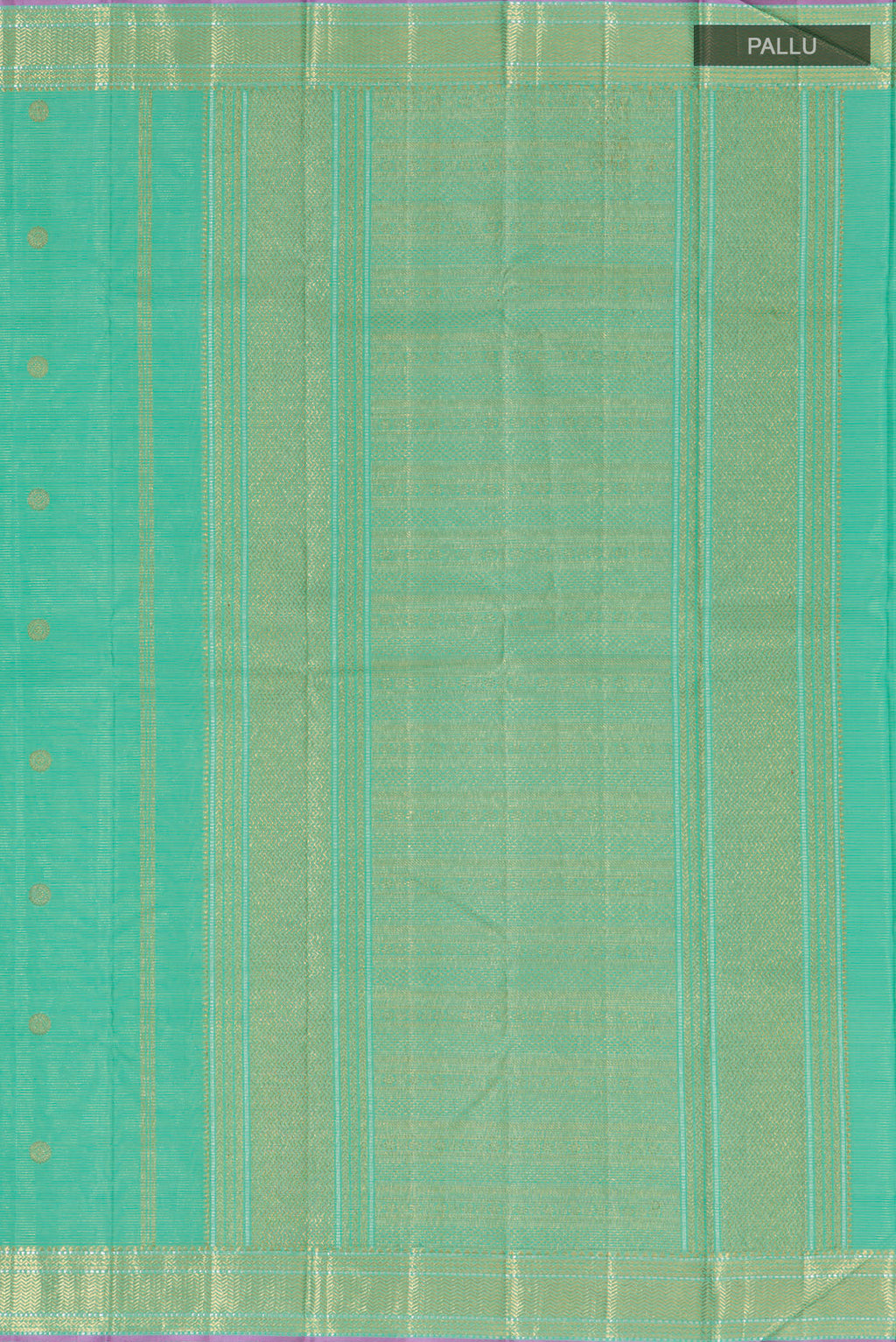 Close up image of the pallu of Green Kanjivaram Saree with Zari Butta on the body and Zari Border. 