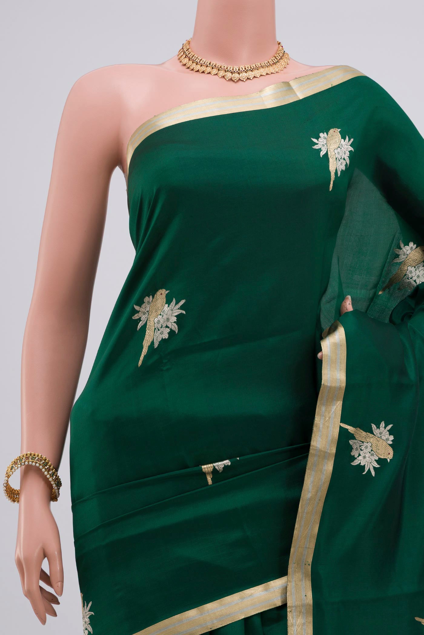 Border image of Bottle Green Banarasi Katan Silk Saree with Zari Butta on the body and Zari Border. 