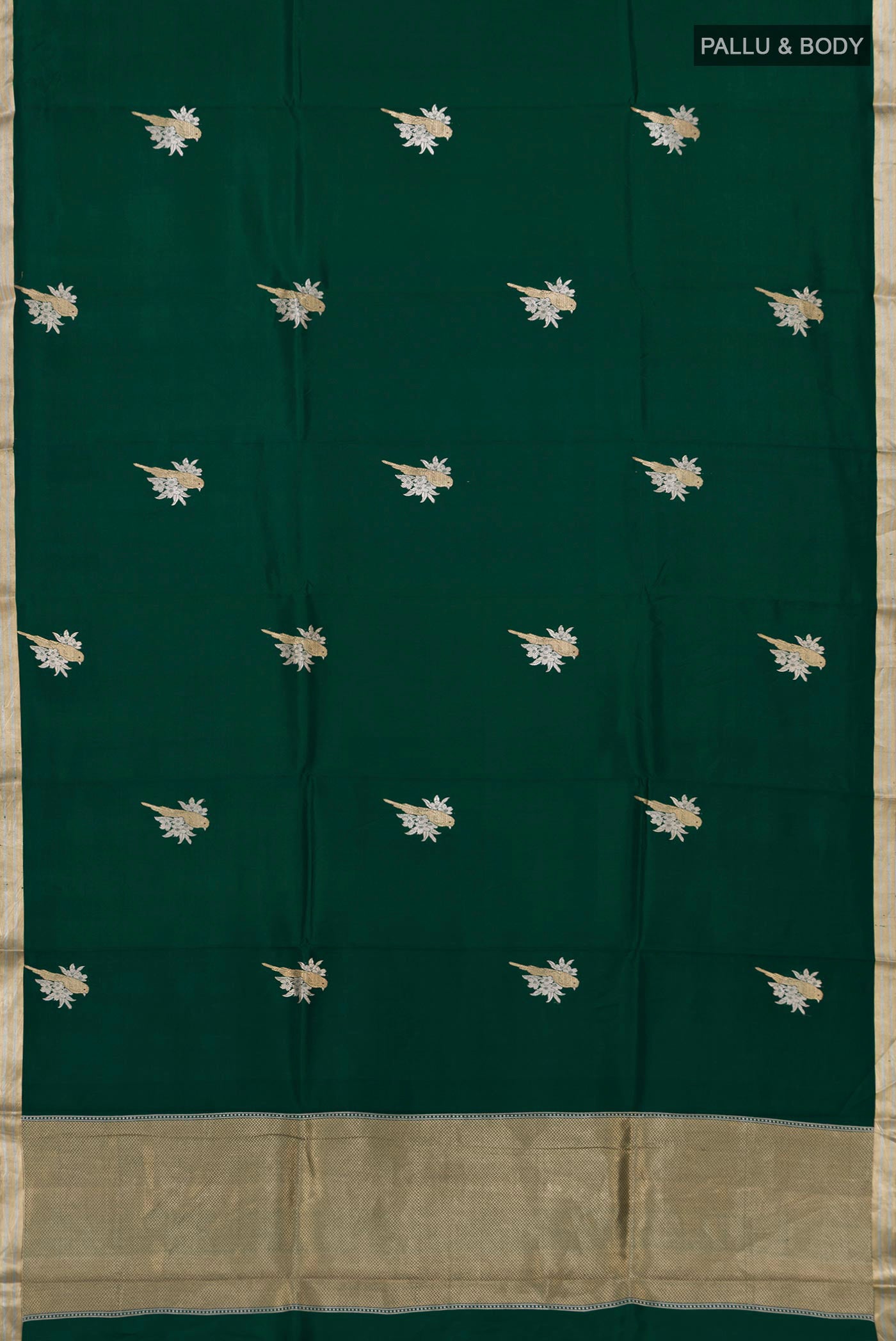 Flat view of Bottle Green Banarasi Katan Silk Saree with Zari Butta on the body and Zari Border. 