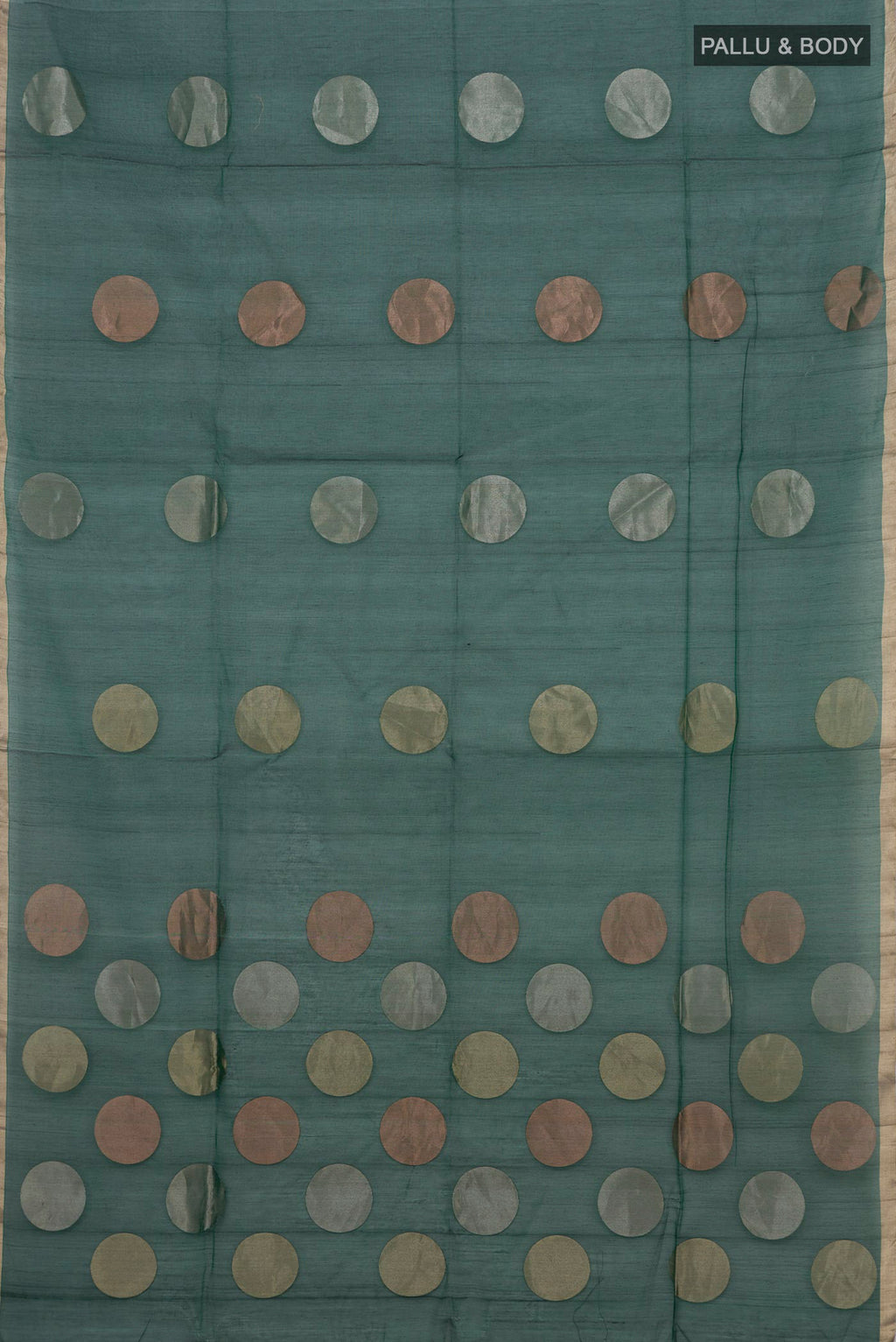 Flat view of Green Silk Cotton Saree with Zari Butta on the body and Thin Zari Line. 