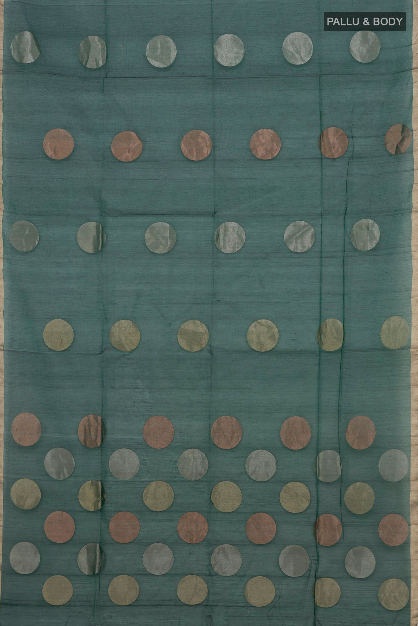 Flat view of Green Silk Cotton Saree with Zari Butta on the body and Thin Zari Line. 