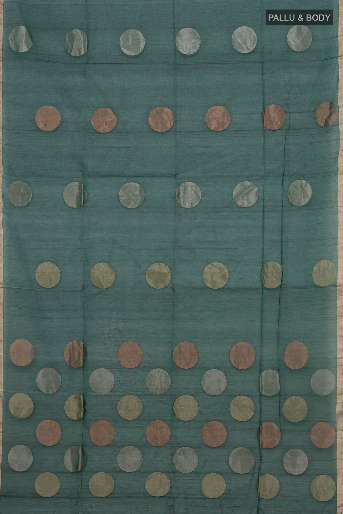 Flat view of Green Silk Cotton Saree with Zari Butta on the body and Thin Zari Line. 