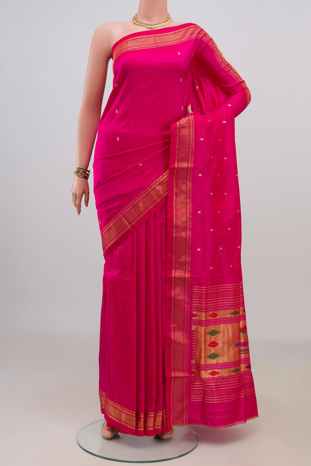 Pure Silk Pink Paithani Saree with Zari Butta on the body and Zari Border.  displayed on a mannequin