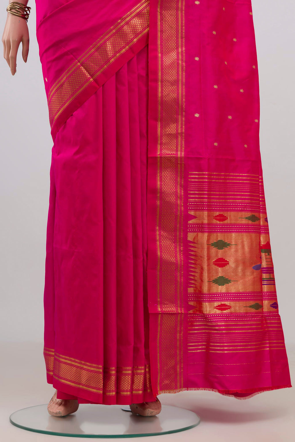 Pleats and pallu of Pure Silk Pink Paithani Saree with Zari Butta on the body and Zari Border. 