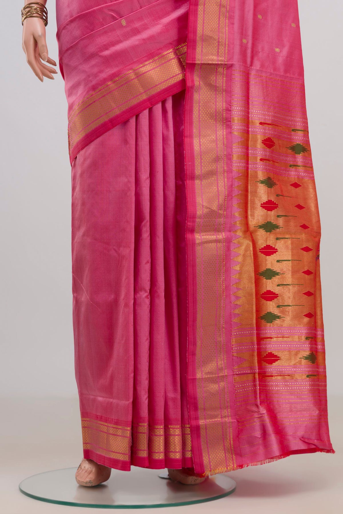 Pleats and pallu of Pure Silk Pink Paithani Saree with Zari Butta on the body and Zari Border. 