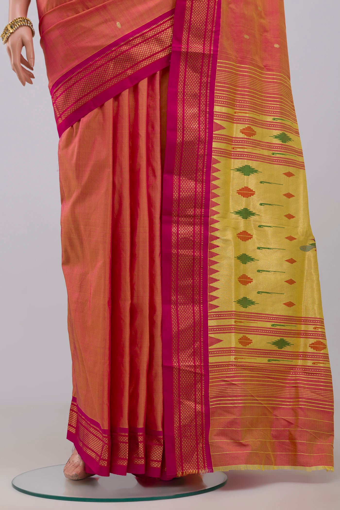 Pleats and pallu of Pink Paithani Silk Saree with Zari Butta on the body and Zari Border. 