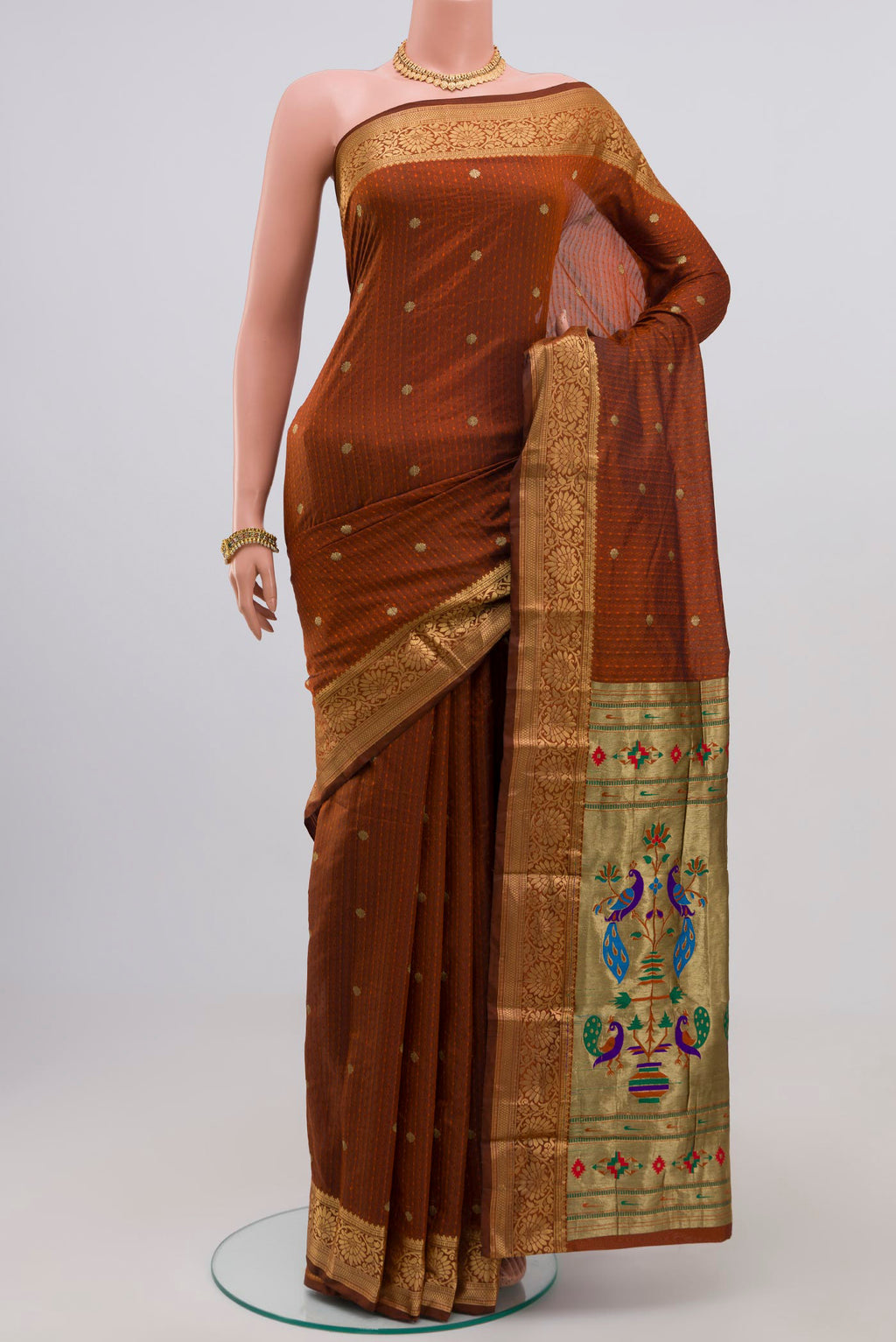 Rust Bangalore Silk Saree with Jacquard With Zari Butta on the body and Zari Border.  displayed on a mannequin