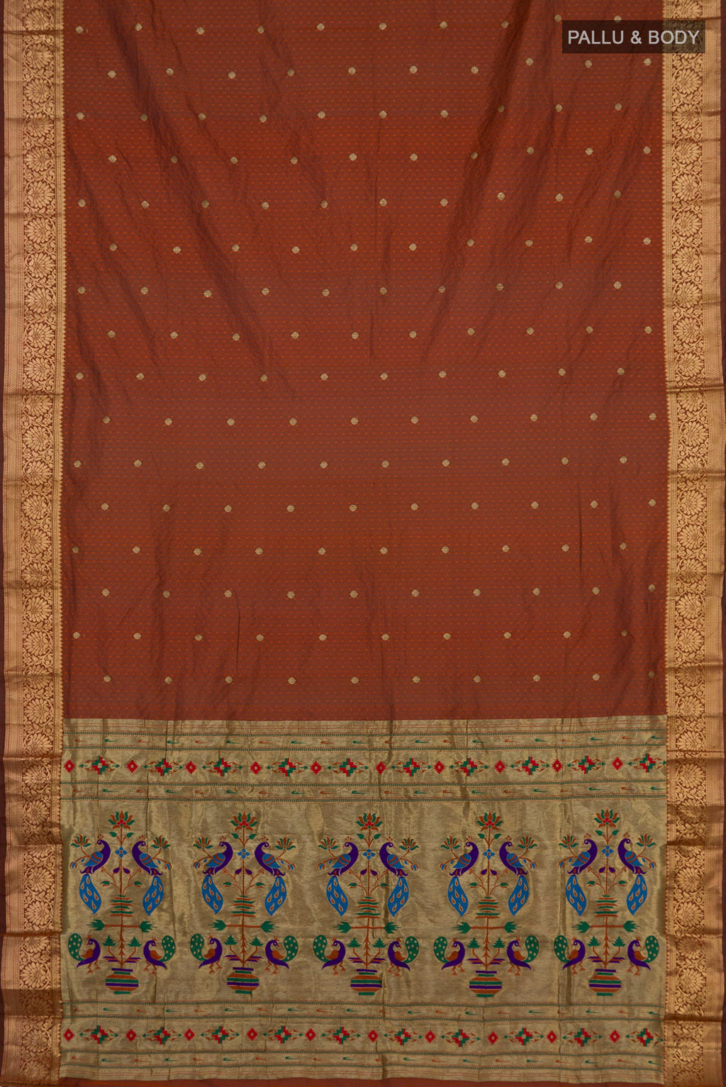 Flat view of Rust Bangalore Silk Saree with Jacquard With Zari Butta on the body and Zari Border. 