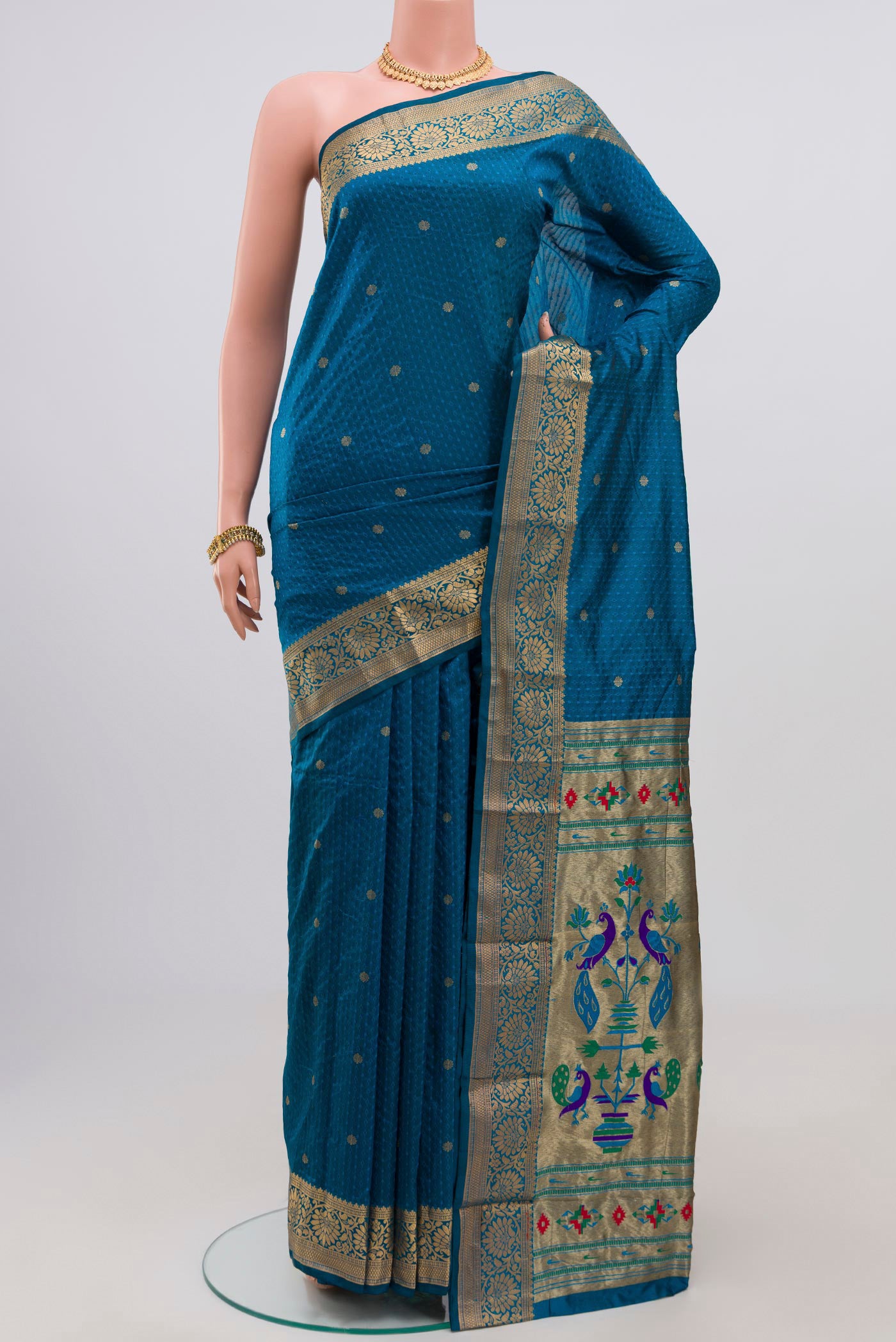 Blue Bangalore Silk Saree with Jacquard With Zari Butta on the body and Zari Border.  displayed on a mannequin