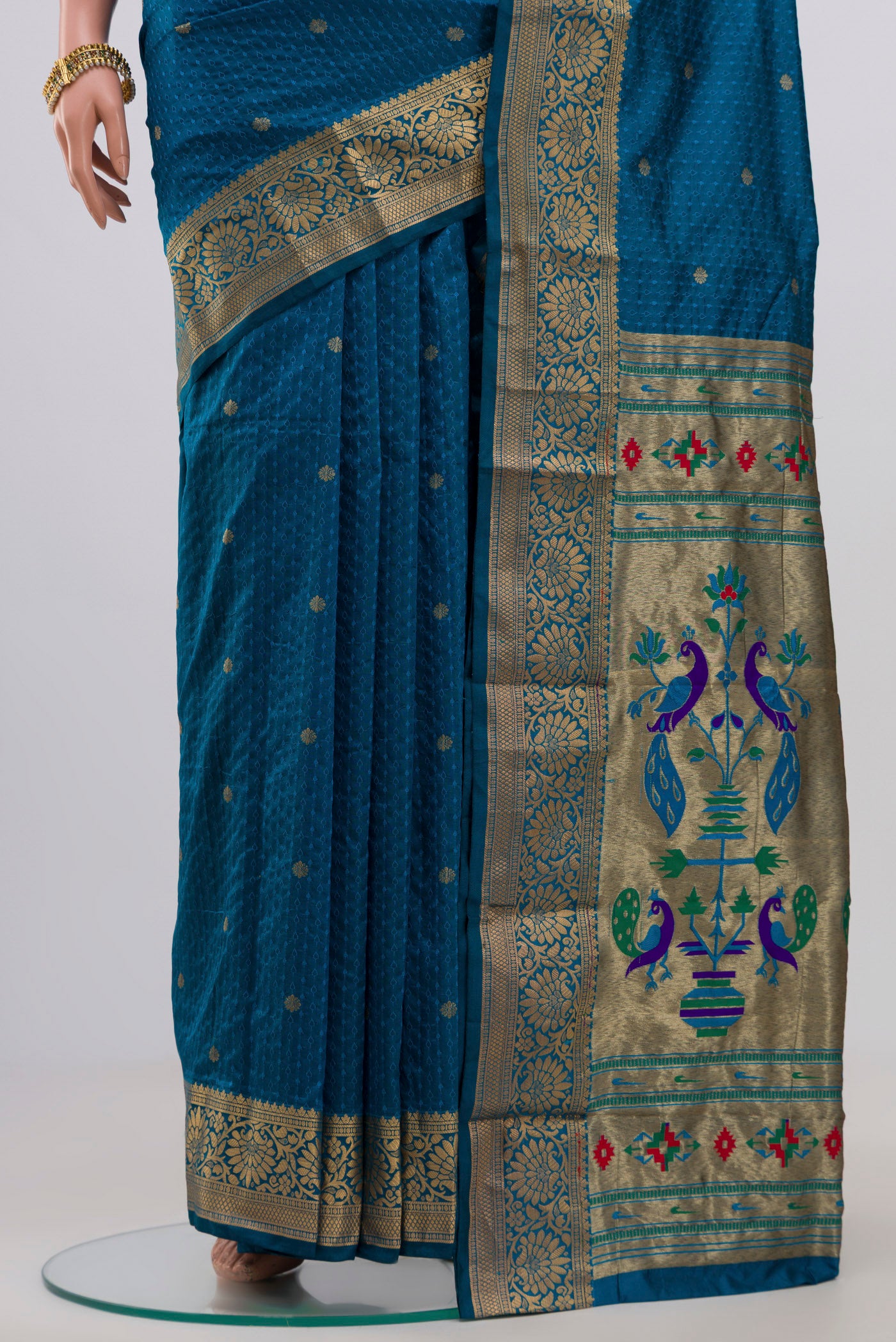 Pleats and pallu of Blue Bangalore Silk Saree with Jacquard With Zari Butta on the body and Zari Border. 