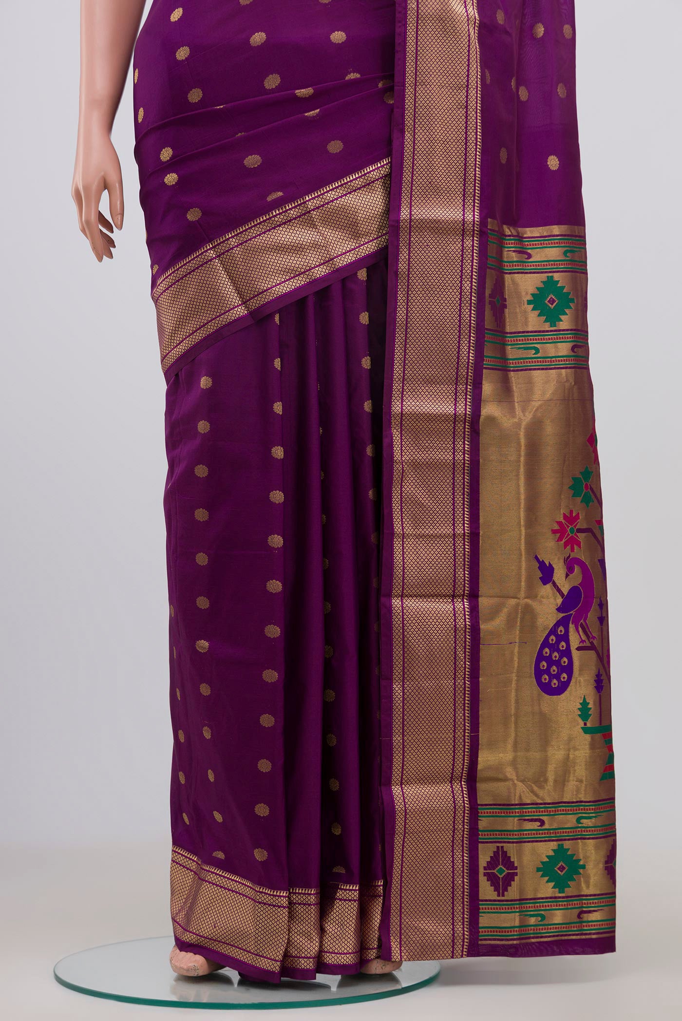Pleats and pallu of Purple Bangalore Silk Saree with Zari Butta on the body and Zari Border. 