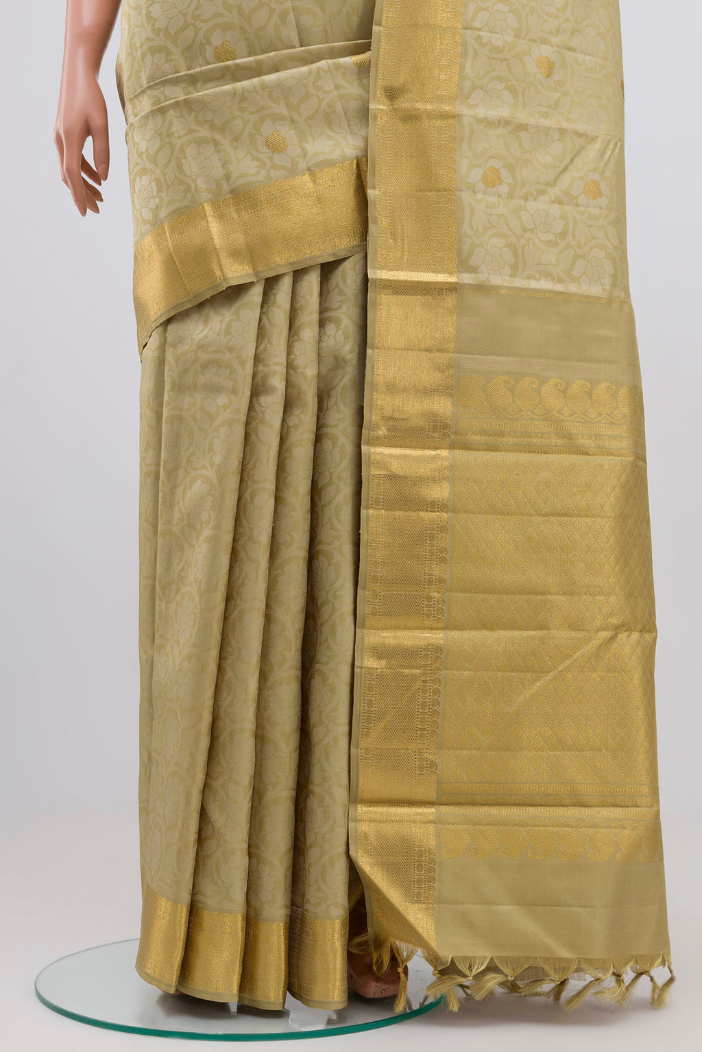 Pleats and pallu of Pure Silk Pure Zari Green Kanjivaram Saree with Jacquard design on the body and Zari Border. 