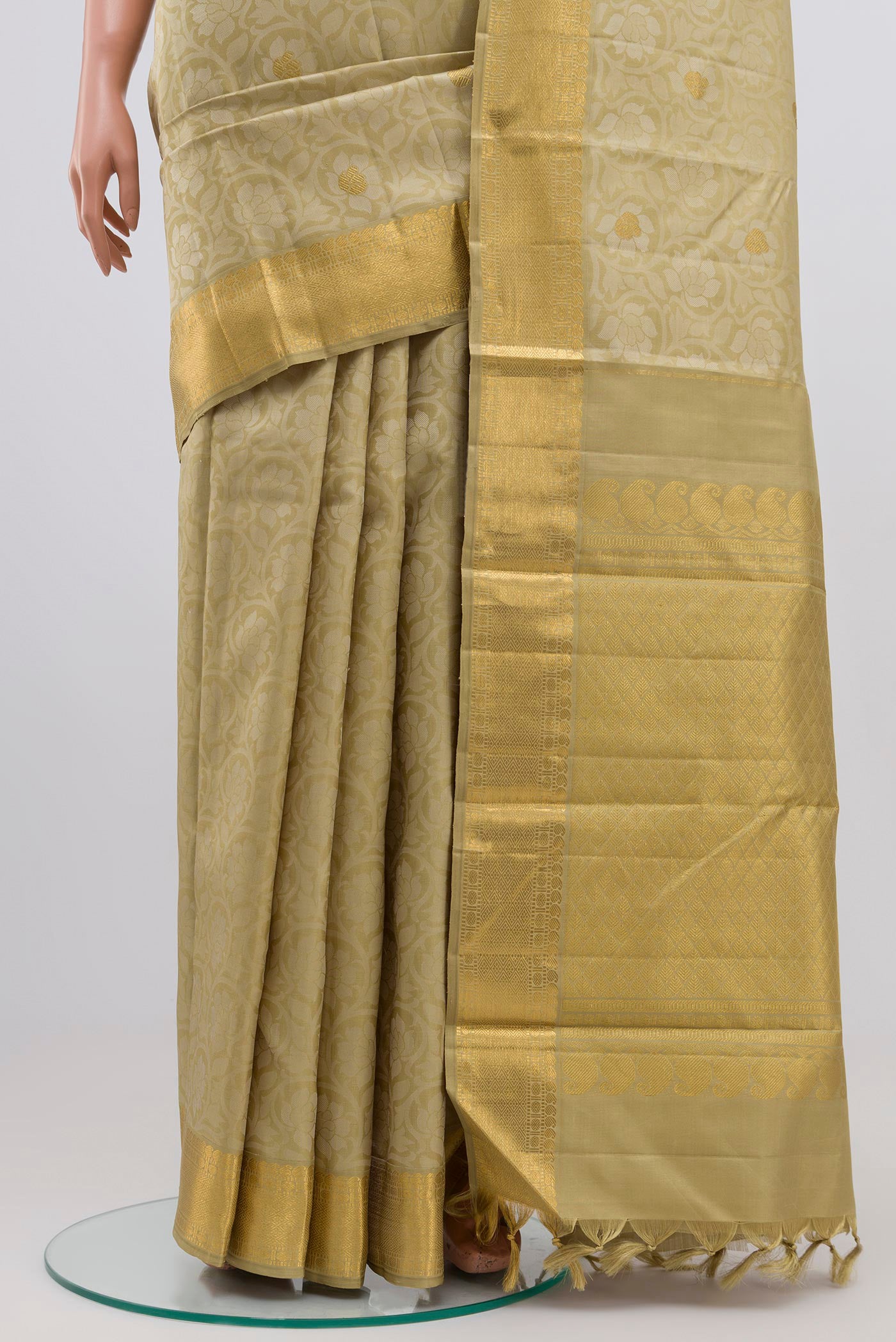 Pleats and pallu of Pure Silk Pure Zari Green Kanjivaram Saree with Jacquard design on the body and Zari Border. 