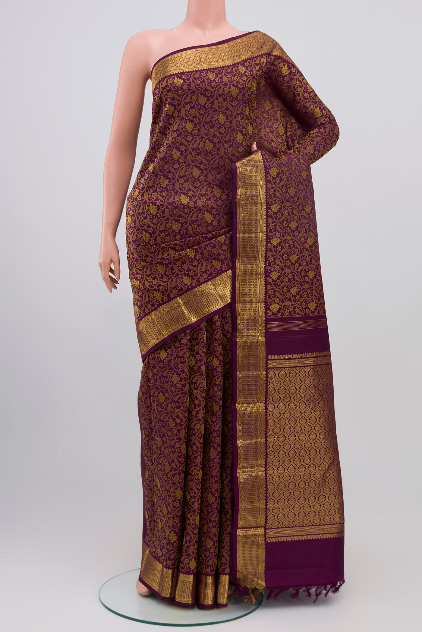 Pure Silk Pure Zari Purple Kanjivaram Saree with Jacquard design on the body and Zari Border.  displayed on a mannequin