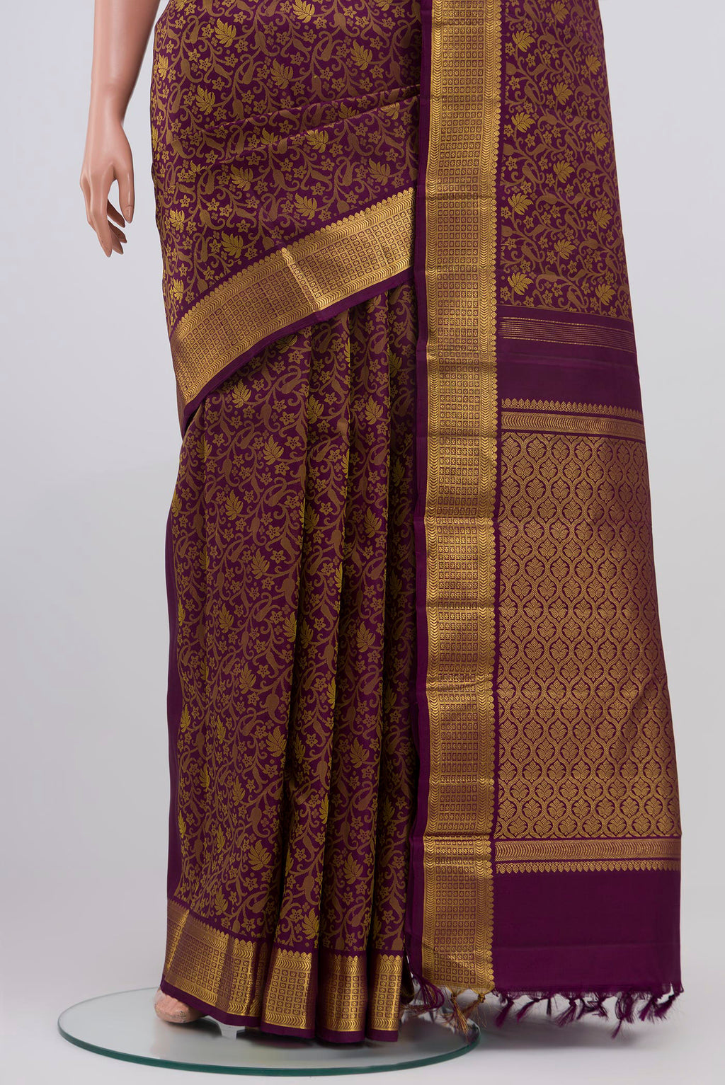 Pleats and pallu of Pure Silk Pure Zari Purple Kanjivaram Saree with Jacquard design on the body and Zari Border. 