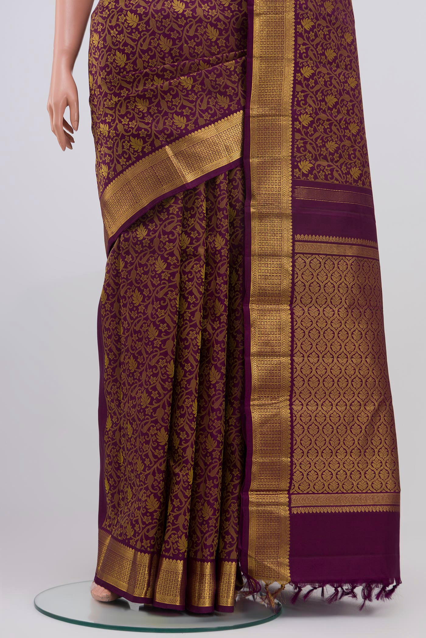 Pleats and pallu of Pure Silk Pure Zari Purple Kanjivaram Saree with Jacquard design on the body and Zari Border. 