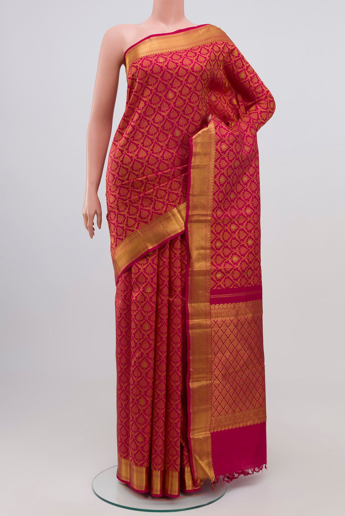 Maroon Kanjivaram Silk Saree with Jacquard With Zari Butta on the body and Zari Border.  displayed on a mannequin