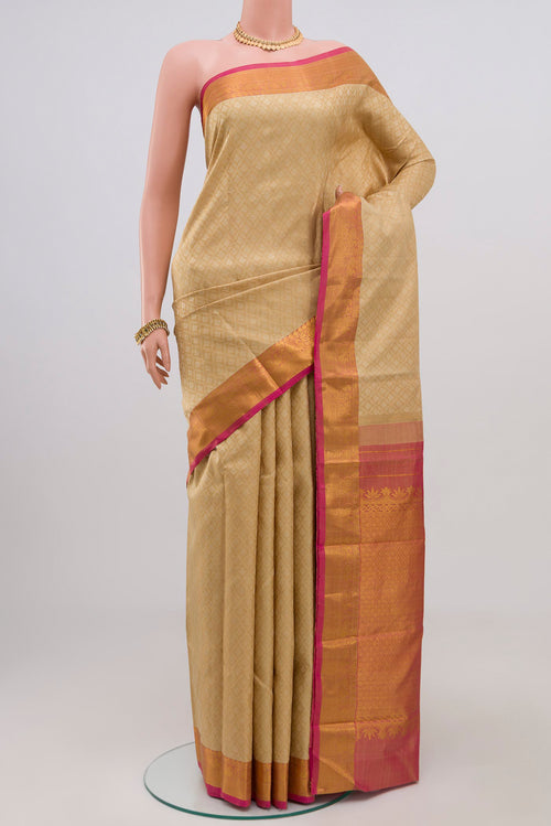 Cream Kanjivaram Silk Saree with Jacquard design on the body and Zari Border.  displayed on a mannequin