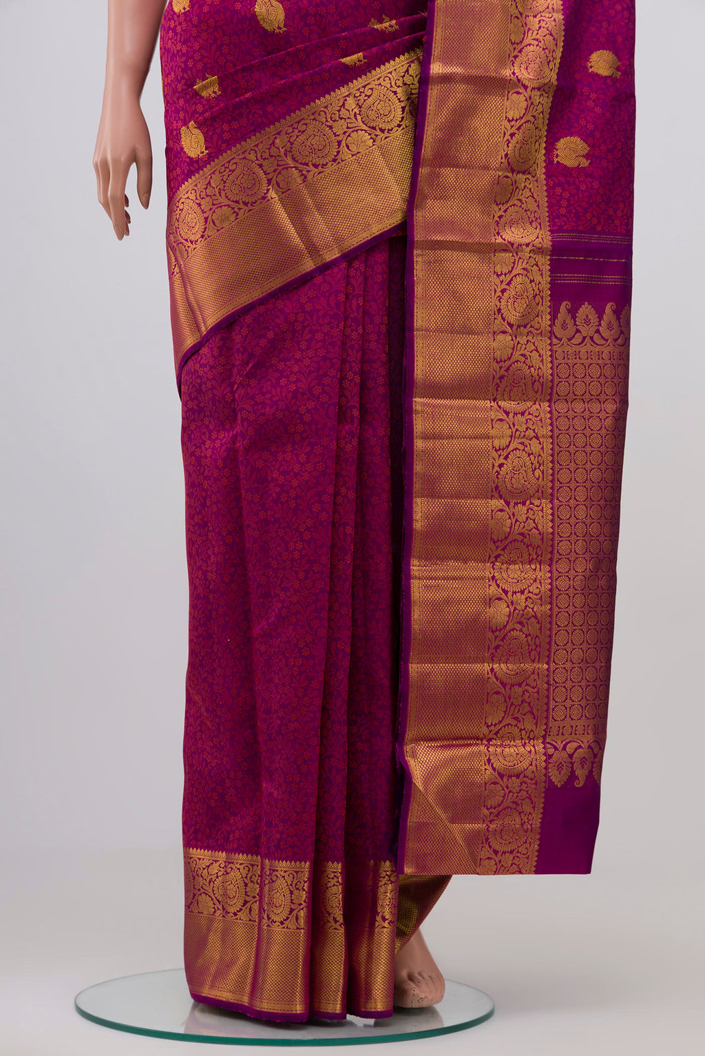 Pleats and pallu of Purple Kanjivaram Silk Saree with Jacquard With Zari Butta on the body and Zari Border. 